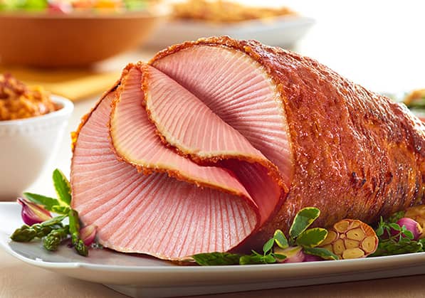HoneyBaked Ham - Sliced ham on dinner table