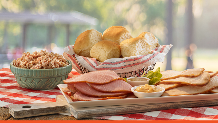 Table with various ham dishes