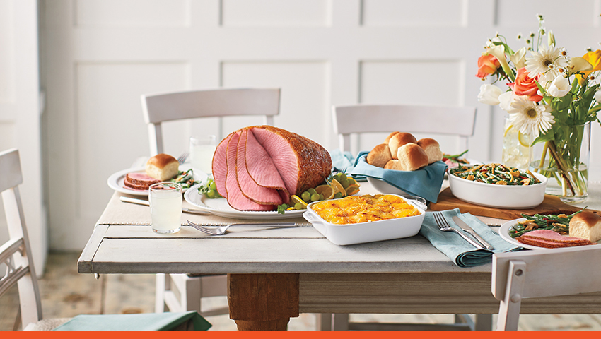 Image of a dinner table set with food