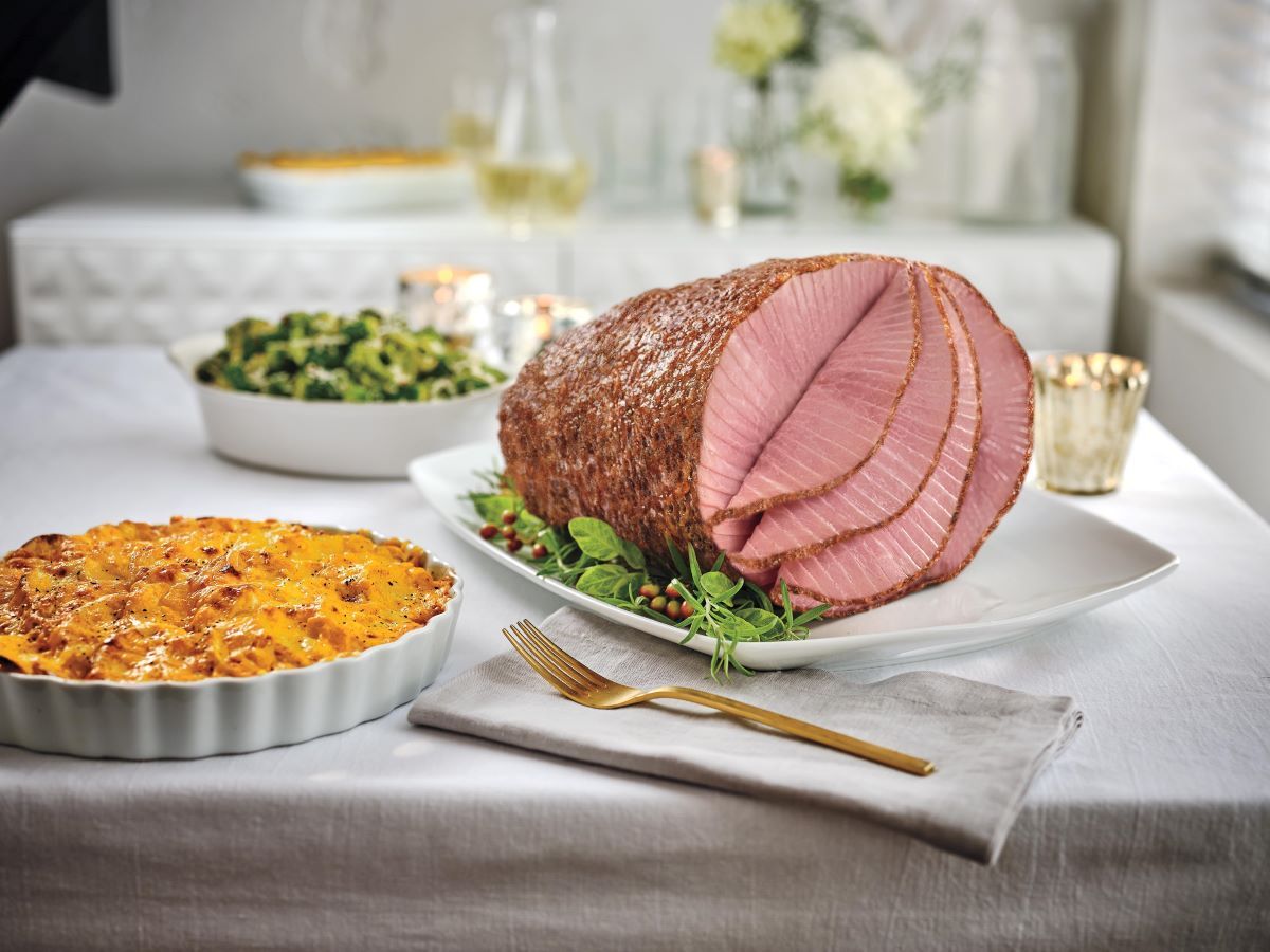 Honey Baked Ham and sides on beautiful table setting